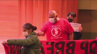 Bass walks out of forum discussion after Chinatown Hillside Villa residents stage protest