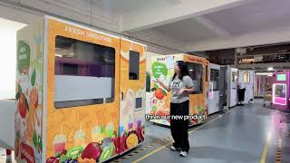 A fresh fruit smoothie vending machine with different payment systems.