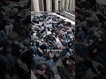 harvard students protest with die in and poetry by refaat alareer for gaza