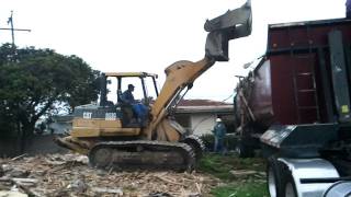 Demolition of House by Bulldozer