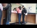 How To Get Arrested, Lady gets arrested for check fraud at a check cashing store.