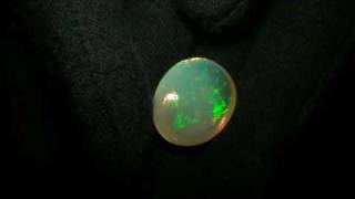 11ct WAVE SHAPED CLEAR CRYSTAL LOOSE ETHIOPIAN OPAL  P186.MPG