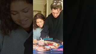 Zendaya and Tom Holland Share PDA Moment While Signing Posters for Charity