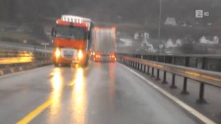 Man nearly crushed by truck almost getting blown over!