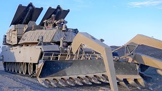 Coolest assault vehicle in action. M1150 ABV Assault Breacher Vehicle.