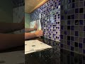 peel and stick backsplash tile over tile