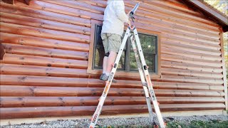 Log siding maintenance using Energy Seal to fill in this year checks. Water penetration is our enemy