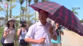 Chinese official threatens to hit journalists