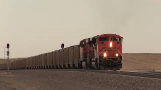 BNSF EMD SD70ACe 9009 Drags Heavy Coal Freight Over The Hills of Wyoming