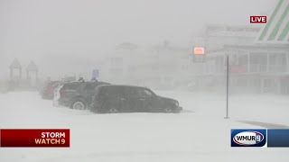 Hampton boardwalk covered in snow, pelted by gusty winds