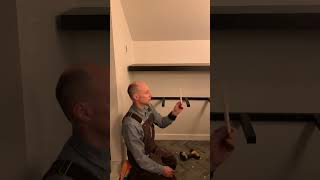 Fixing a sloping floating shelf.