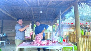 Pigs on the farm have grown up - MAI and her father brought pork to sell in the village.