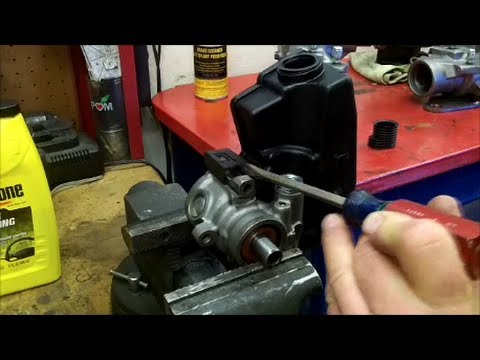 How to Remove & Replace Power Steering Reservoir on a Jeep Cherokee & Wrangler How to Remove & Replace Power Steering Reservoir on a Jeep Cherokee & Wrangler