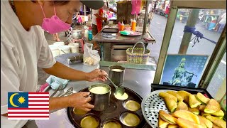 Malaysia trip. Penang's famous traditional crepe. Apom manis. At a local food stand.