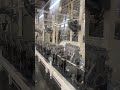 Let me take you to see our auto engine production line while workers take a break