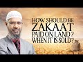 How should Zakat be paid on land? when it is sold?