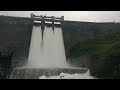 sholayar dam valparai with opened shutter