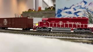 INRD 9025 makes its way through a Winter Wonderland on the Gateway NTrak Layout