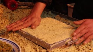 On the streets of Shaanxi, 15 boxes of snacks are made and sold now