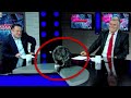 Cat Interrupts News Program to Clean Itself on TV #shorts