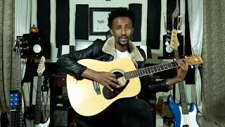 Guitar lesson by Afan Oromo.marsa lammaffaa