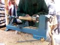 Wood Turner Making A Spinning Top