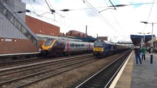 DRS 68028 leads 68025 speeds though Doncaster with a London Kings Cross to Durham Northern Belle