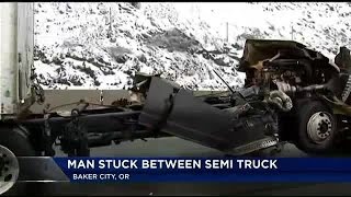 Driver pinned between 2 semi trucks in 26-vehicle crash