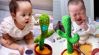 Babies play dancing cactus toy. Cutest baby funniest moments.