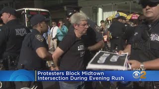 Protesters Block Midtown Intersection During Evening Rush