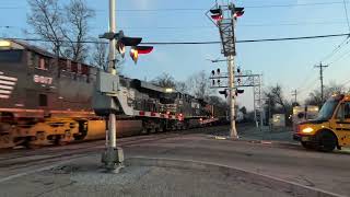 Early Morning Trains with Beautiful Sunrise over a Coal Train