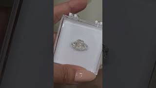 4.25ct G VS1 RAD WITH 1.16CT F VVS TRAPEZOUD SIDE STONES