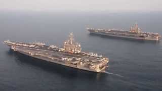 USS Carl Vinson (CVN 70) relieves USS George H.W. Bush (CVN 77) in Arabian Gulf