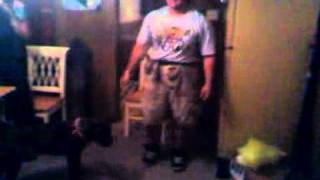 Fat man attempting a hand stand