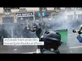 police clash with protesters across paris who threw petrol bombs in violent labour day march