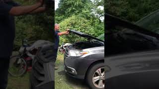 Raccoon Found Hiding Under Car Hood || ViralHog