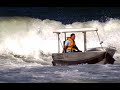 Old surfer bravely surfs waves in his 4.2m/14ft boat!