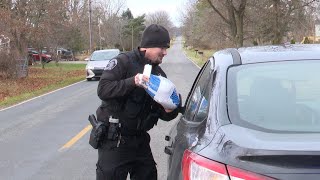 Ingham Co. deputies trade in tickets for turkeys ahead of Thanksgiving