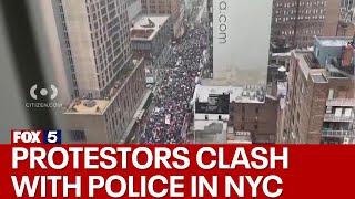 Protestors clash with police in Times Square