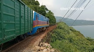 D19E - 947 drew , D11H - 357 pushed freight train run along the beach