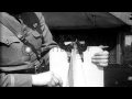 Men load bombs onto an aircraft in Clermont, France during World War I. HD Stock Footage