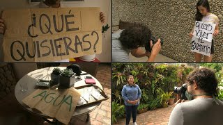 A Venezuelan photographer portrays people's wishes on posters | AFP