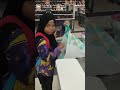 Program Kemahiran Sosial Di Tempat Awam - Umairah mengira bilangan barangan yang dibeli