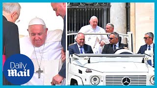 Pope looks frail as he exits Popemobile for weekly general audience at the Vatican