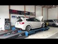 subaru sti hatchback shoot flames on the dyno.