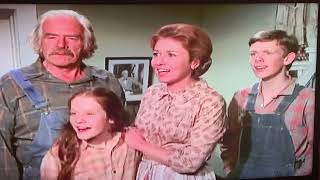 The Waltons~The Deed John Boy returns home with money he got as a reward for catching the robbers.