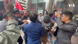 Supporters and Protesters of China Clash During APEC Forum | VOA News