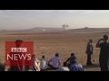 Kurds watch bombing of Kobane from Turkish border - BBC News