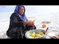 surviving the coldest village in afghanistan 63°c shepherd mother cooking fish curry recipe