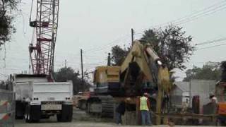 KOMATSU PC1000 digging a DEEP trench